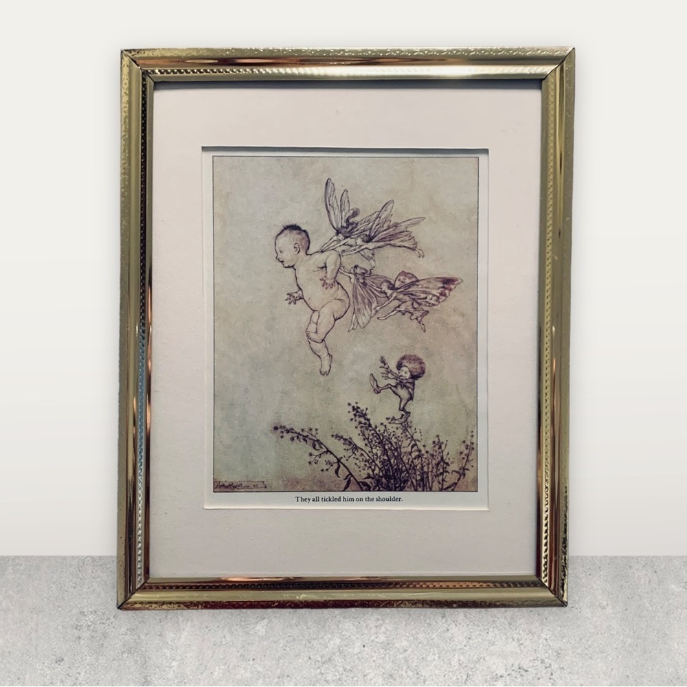 Little cherub faerie playing in the grass 8x10” gold metal frame​​​​​​​​​​